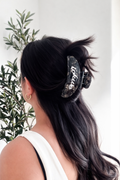 NEW IOKWE BLACK MARBLE AND WHITE CLAW